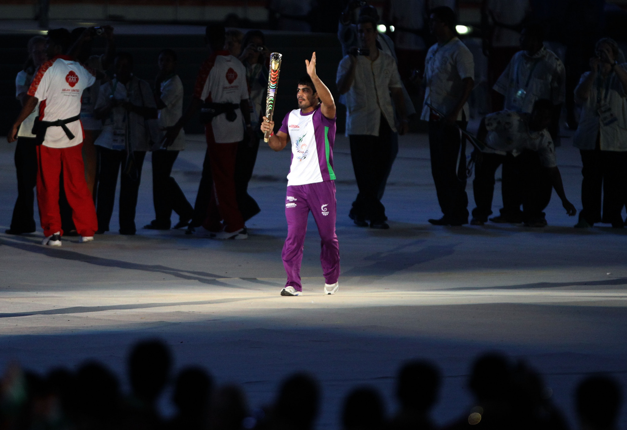 Sushil Kumar of India carries the Queen's baton during the Opening Ceremony for the Delhi 2010 Commonwealth Games at Jawaharlal Nehru Stadium ©Getty Images