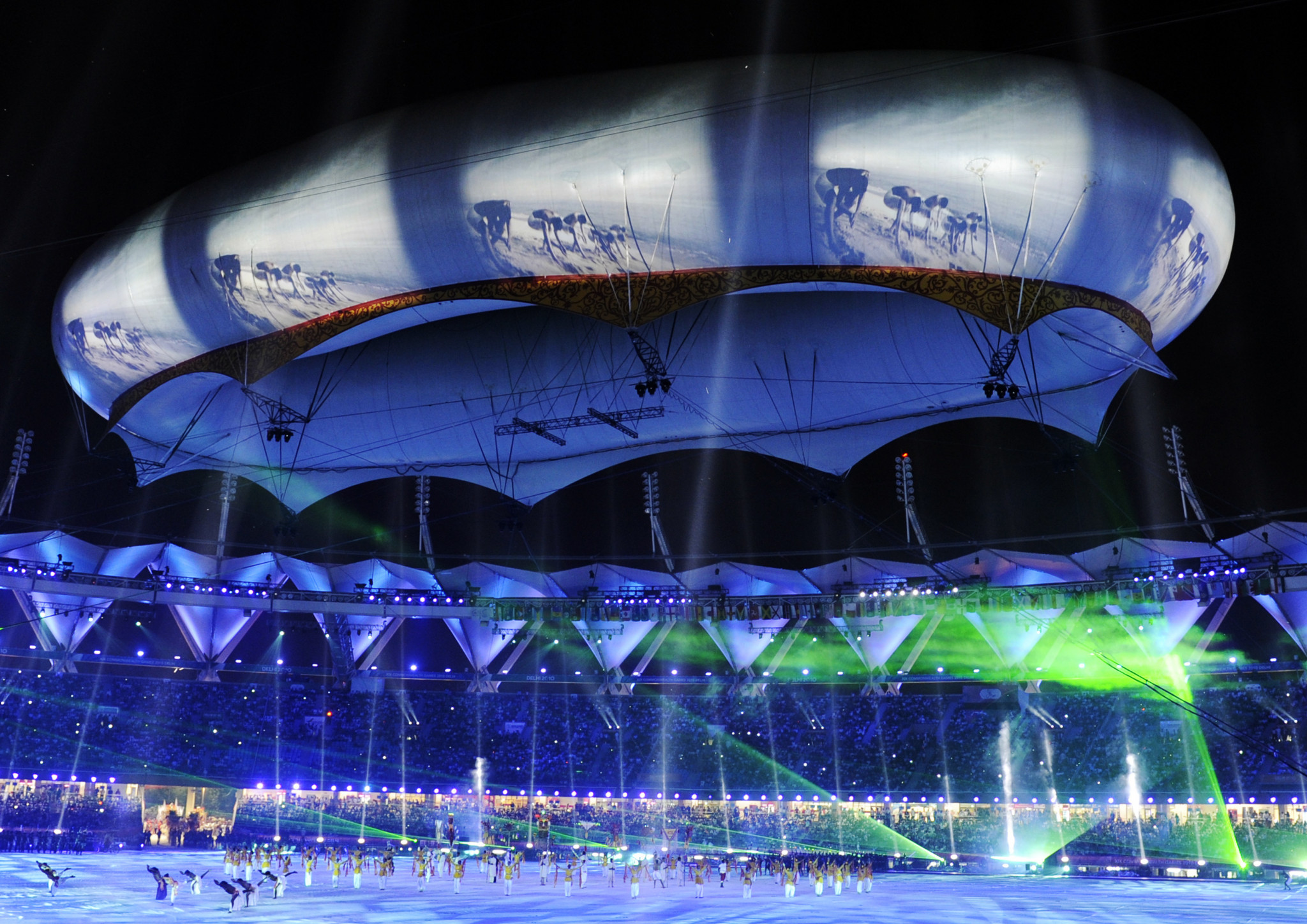 Indian dancers perform below the aerostat at the closing ceremony of the XIX Commonwealth Games at Jawarharlal Nehru Stadium in New Delhi on October 14, 2010 ©Getty Images