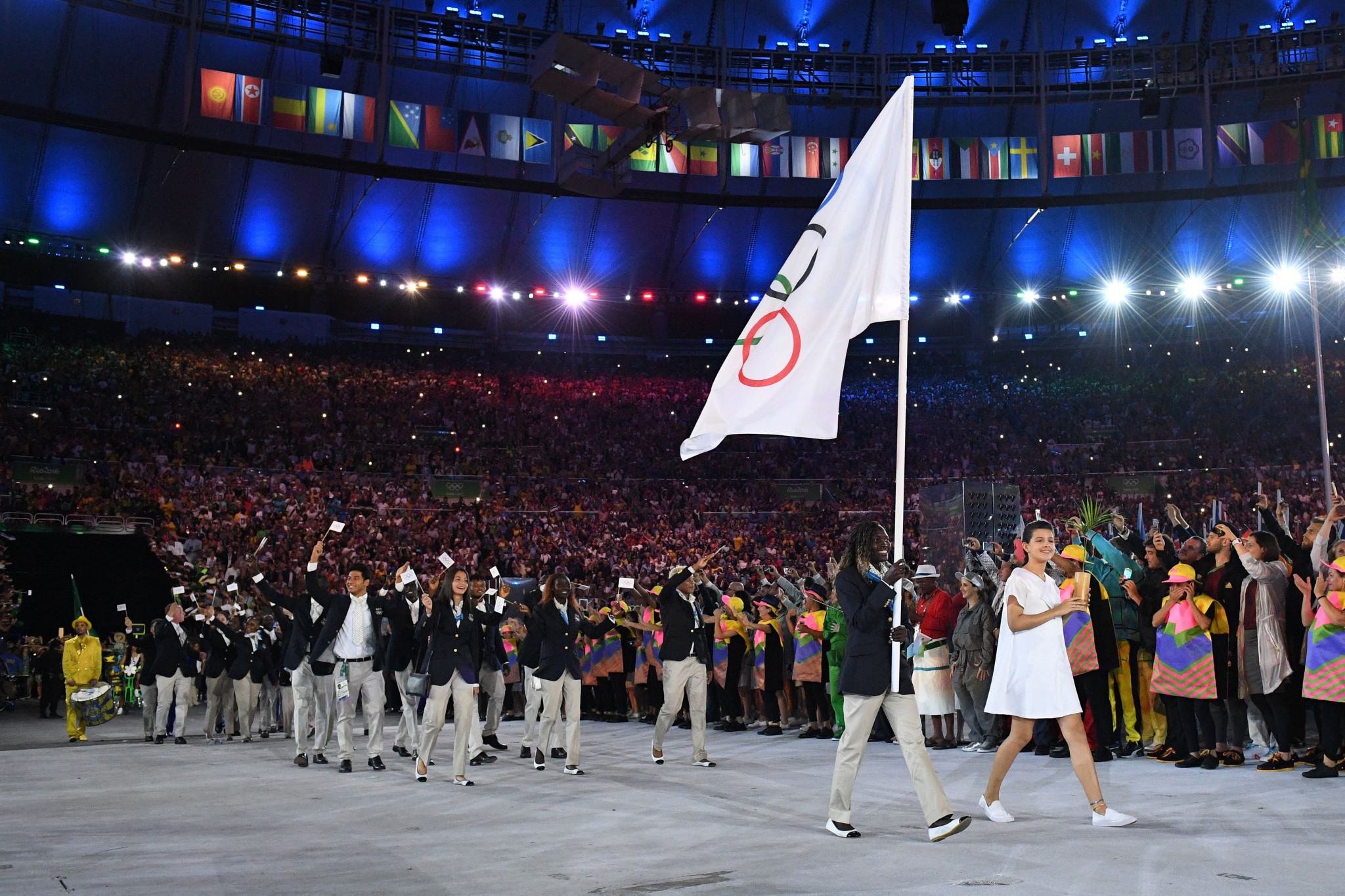 Refugee Olympic Team's flag bearer Rose Nathike Lokonyen leads the delegation during the opening ceremony of the Rio 2016 Olympic Games at the Maracana stadium ©Getty Images